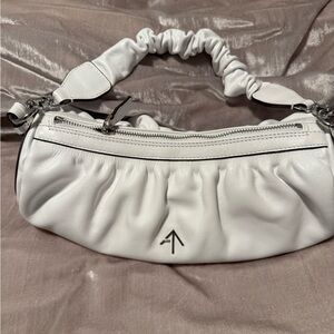 Manu Atelier Ruched Cylinder shoulder bag in white leather.